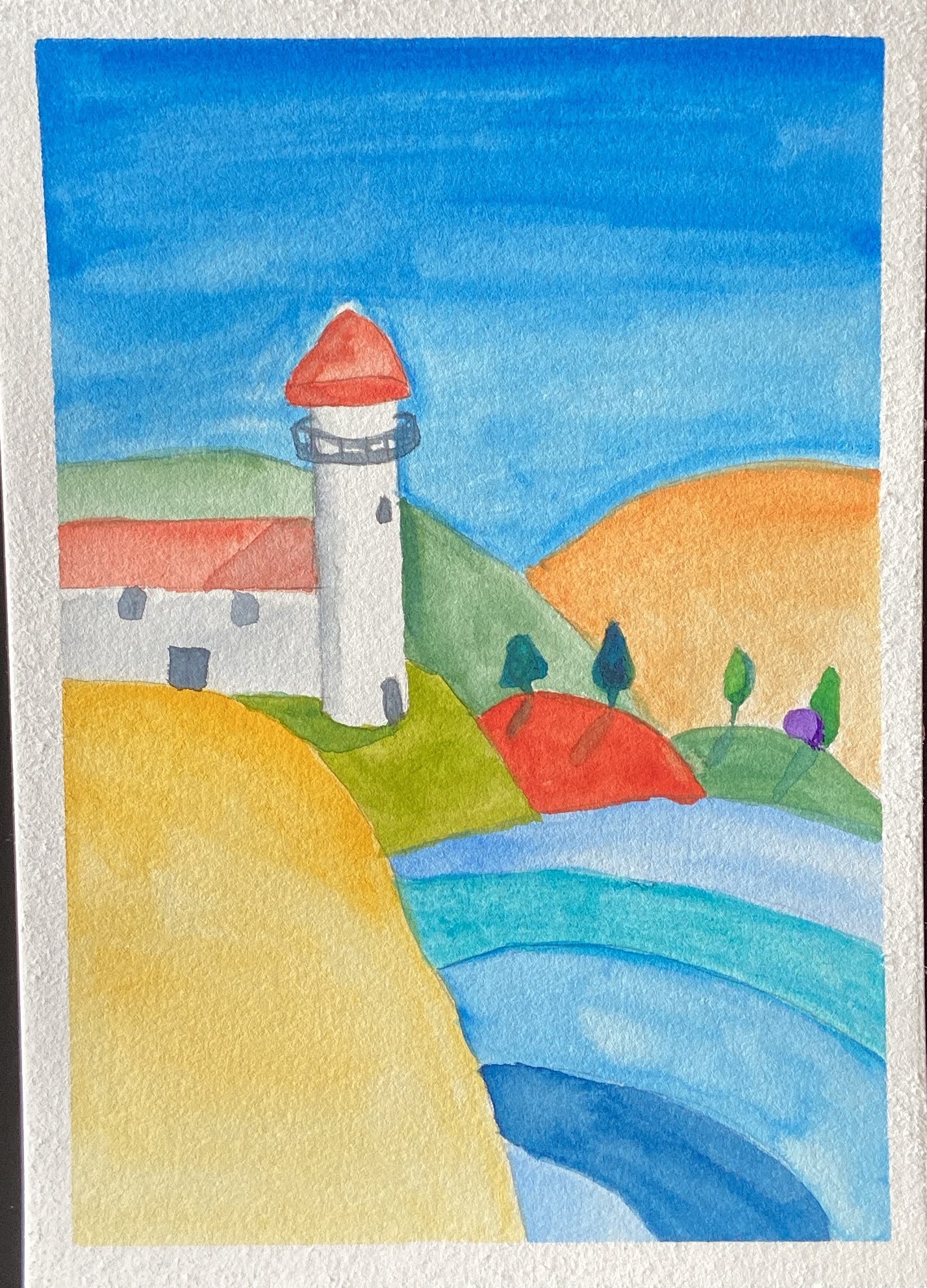 Image of a lighthouse by water